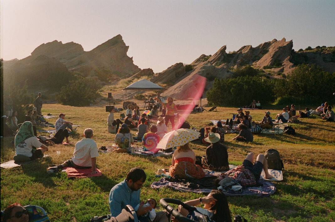 Iasos performing with Floating at Vasquez Rocks.
